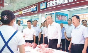 刘国中：落实落细政策举措 保障居民猪肉消费